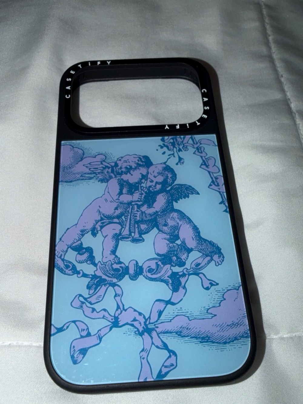 iPhone 17 pro Casetify Blue Cherub iPhone Case with Pink Accent